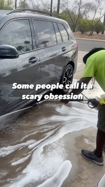 Exterior vehicle wash in progress on a Scottsdale street